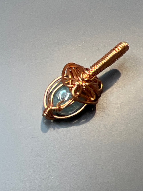 Hand wire-wrapped pendant with copper wire