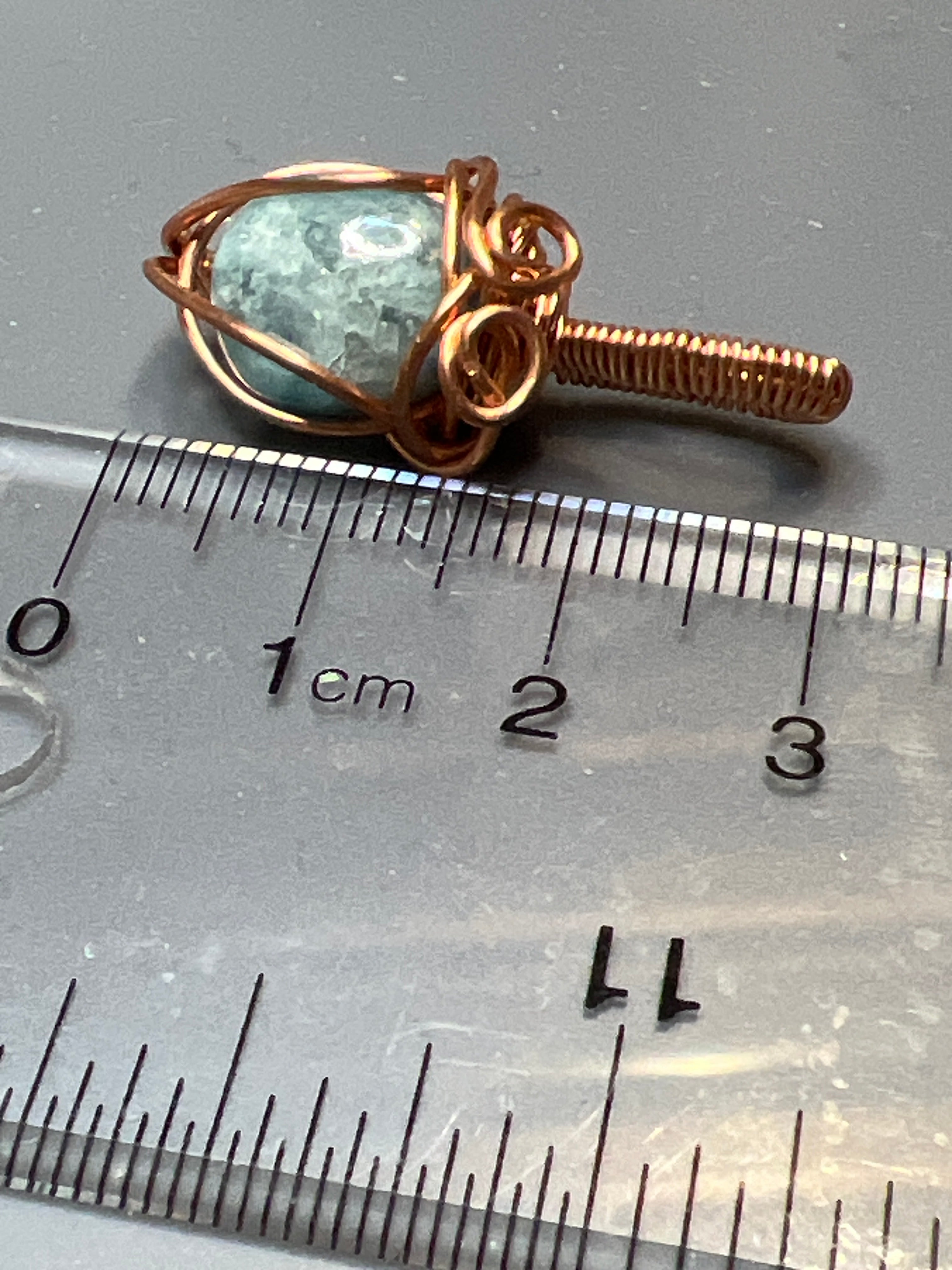 Hand wire-wrapped pendant with copper wire