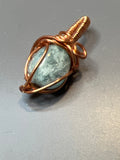 Hand wire-wrapped pendant with copper wire